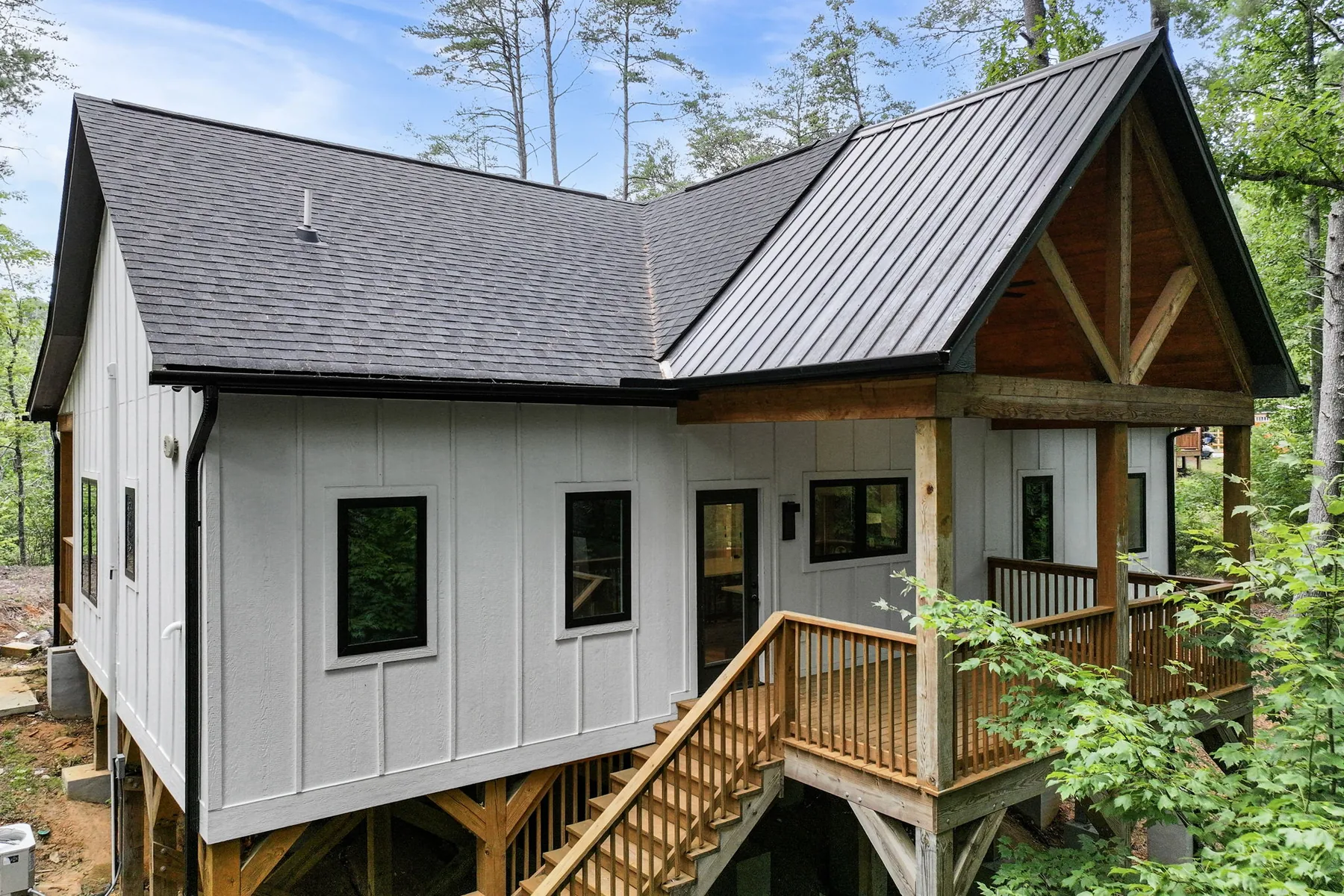 Side elevation showing elevated foundation and stairs on a hillside build, Lake Lure NC